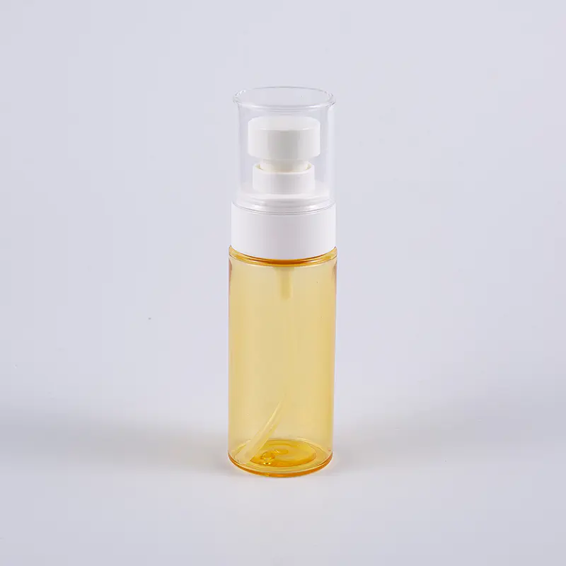 Puoliläpinäkyvä värillinen pyöreä muoto 50 ml PETG paksuseinäinen voidepullo muovisella ruiskupumpulla 