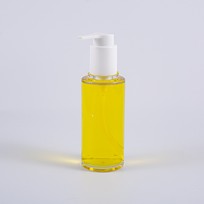 Kirkas PETG 100 ml:n pyöreä voidepullo valkoisella muovipumpulla