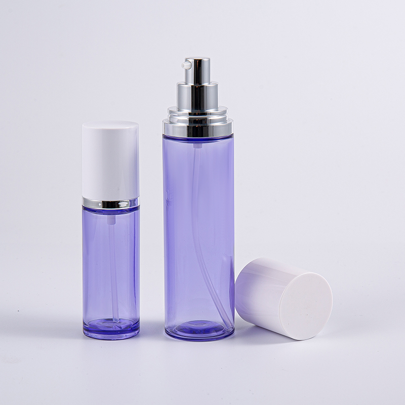 Purppuranvärinen 100 ml:n pyöreä seerumipullo alumiinipumpulla Purppuranvärinen 100 ml:n pyöreä seerumipullo alumiinipumpulla