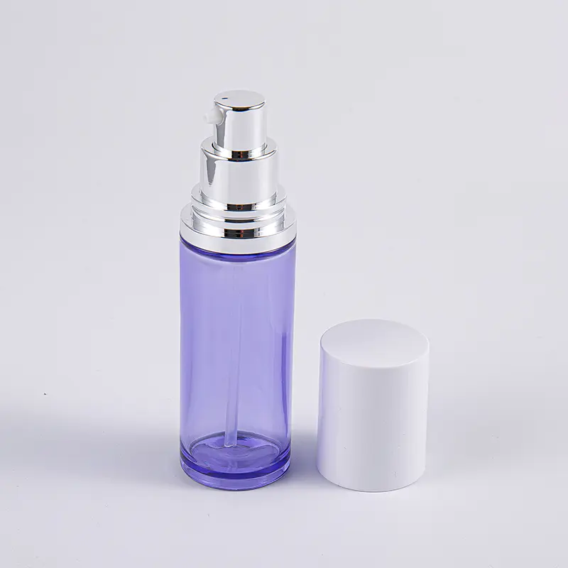 Purppuranvärinen 100 ml:n pyöreä seerumipullo alumiinipumpulla